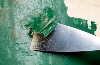 remove paint with a chisel