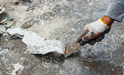 scraping paint off wall